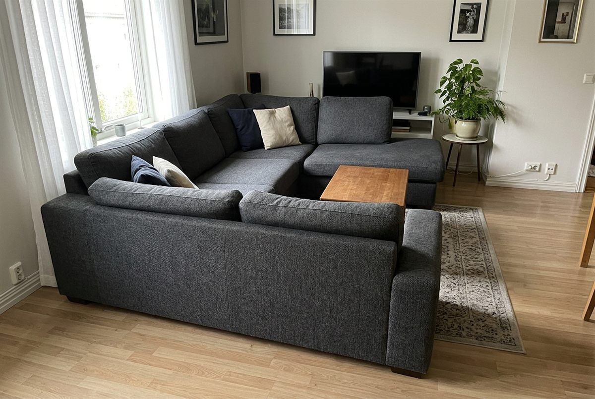 Charcoal corner couch in a bright living room