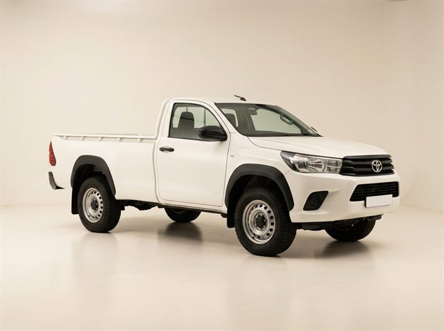 White Toyota Hilux single cab bakkie photographed in a studio